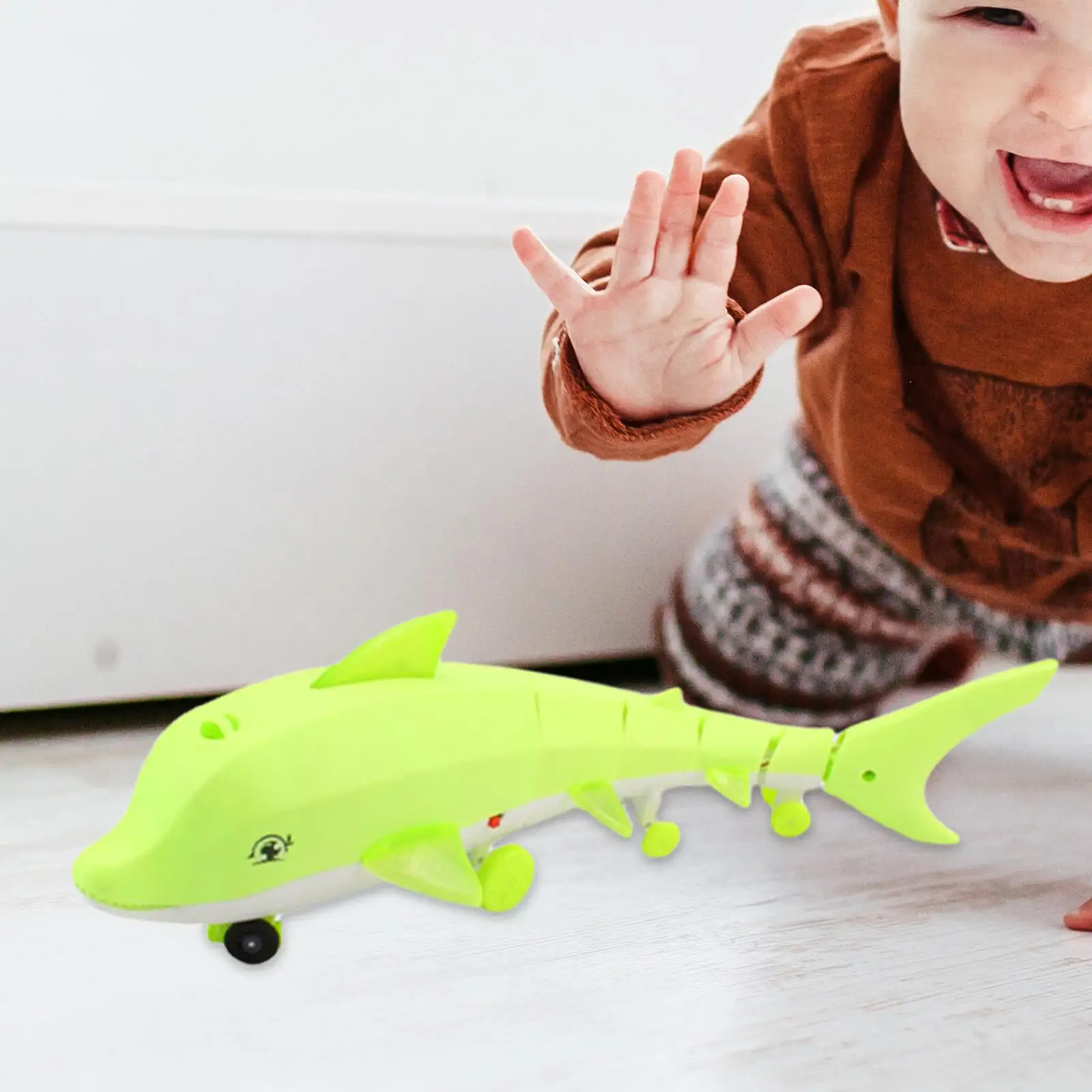 

Creative Kids Pull Rope Dolphin Luminous Toy Cool LED Light Swing Tail Battery