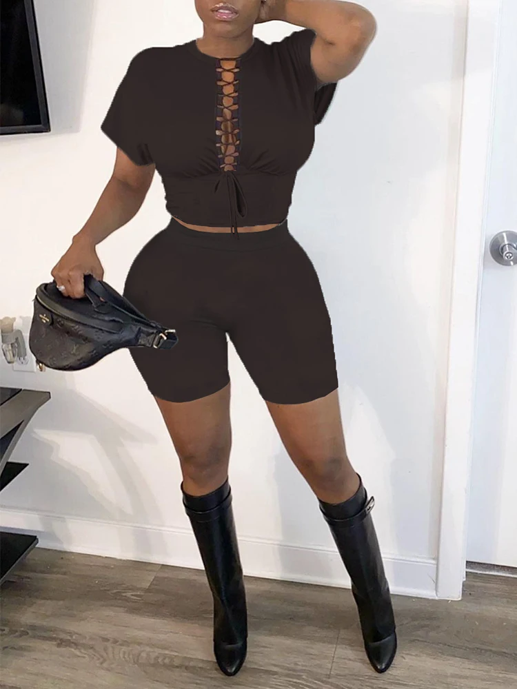 

Simple Fashion Two Piece Workout Sets for Women Lace Up Hollow Short Sleeve Crop Top and Elastic Jogger Short Pant Female Suits
