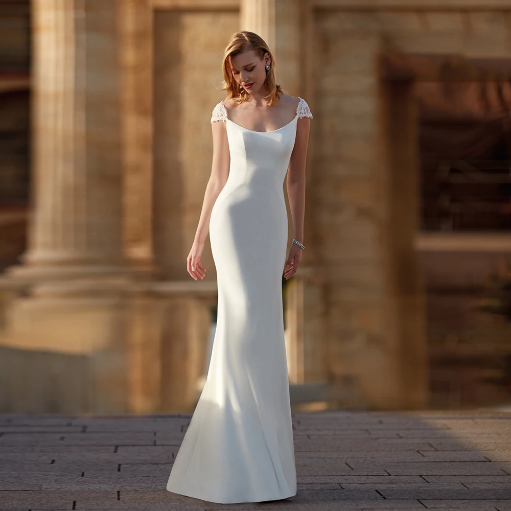 

Elegant Mermaid Wedding Dresses O Neck Cap Sleeves Bridal Gowns Appliques Backless Floor-Length 2023 فساتين مناسبة حسب الطلب