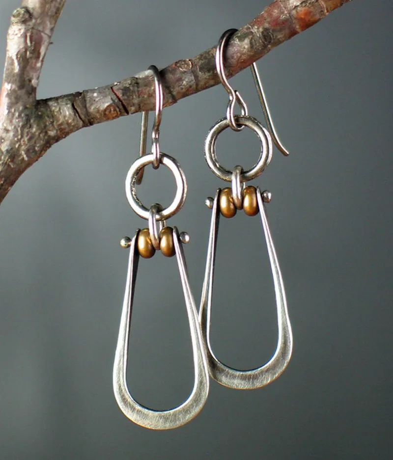 

Retro Minimalist Water Droplets Hollow Hook Earrings for Women Creative Silver Color Metal Two Tone Handmade Dangle Earrings