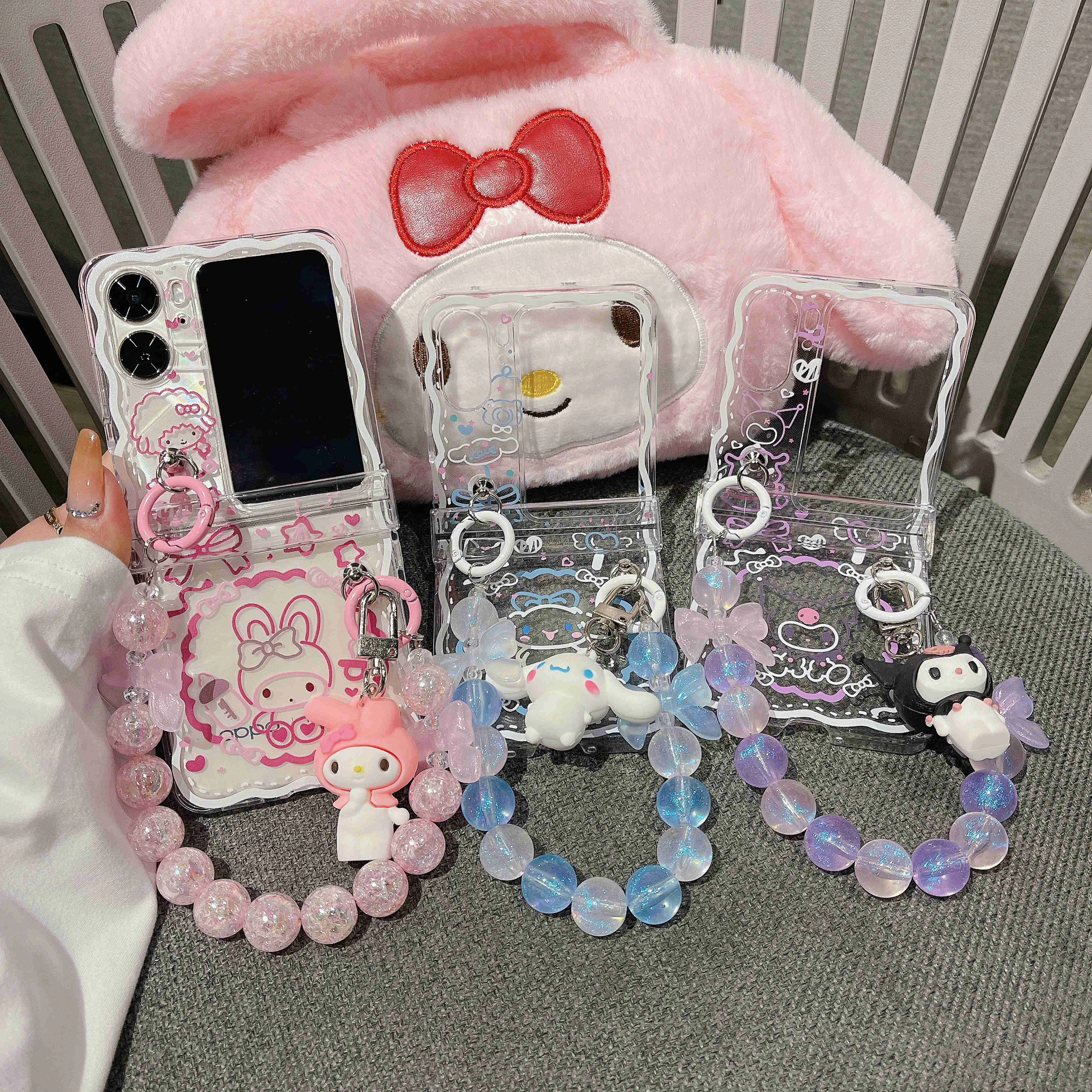 

Cute Sanrio My Melody Kuromi Cinnamoroll Hand Chain With Doll Pendant Phone Case For OPPO Find N2 Flip Wavy Transparent Cover