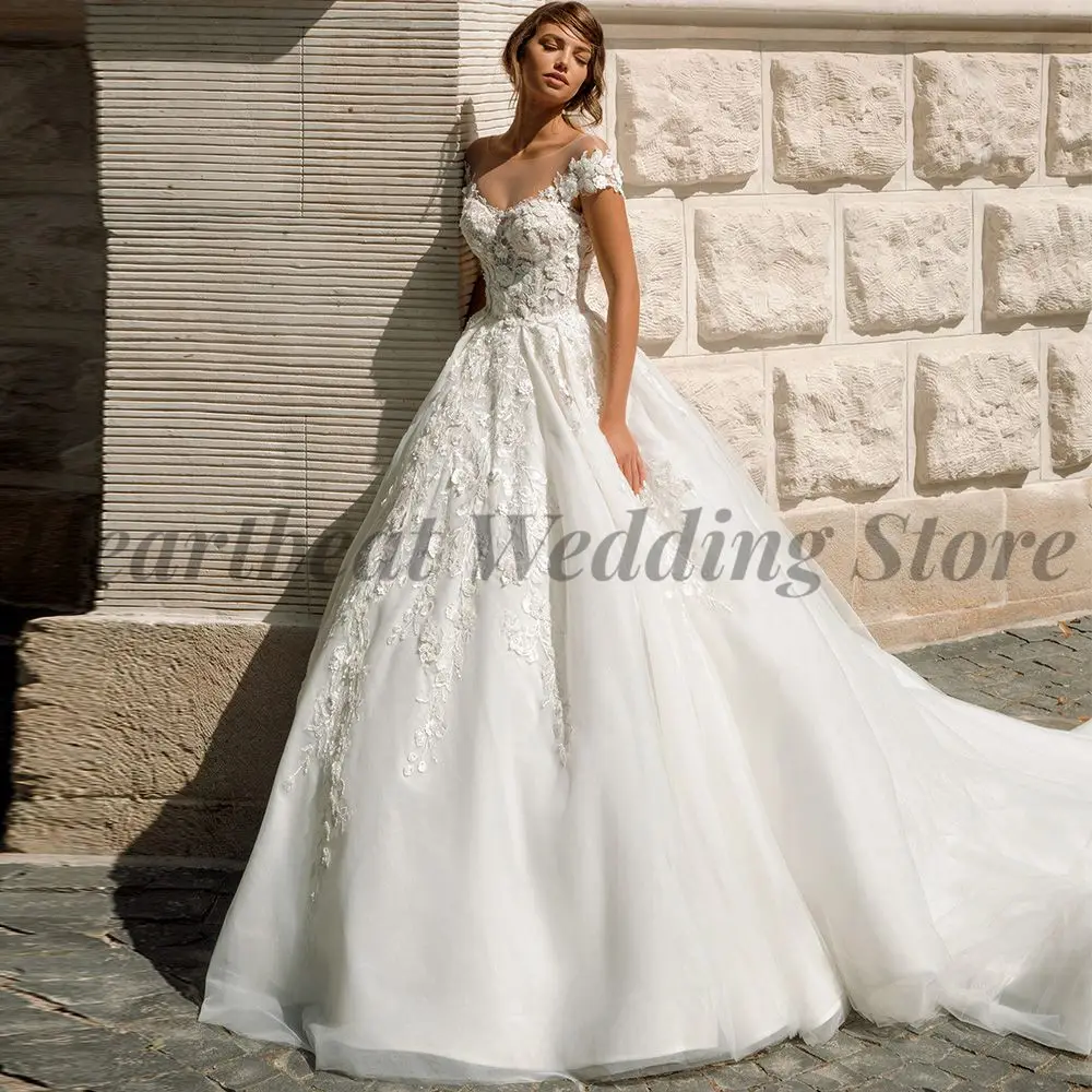 

2023 Short Sleeve Wedding Dress A-Line for Ladies with V-Neck Backless Applique Beads Pearls and Court Train Classic Bridal Gown