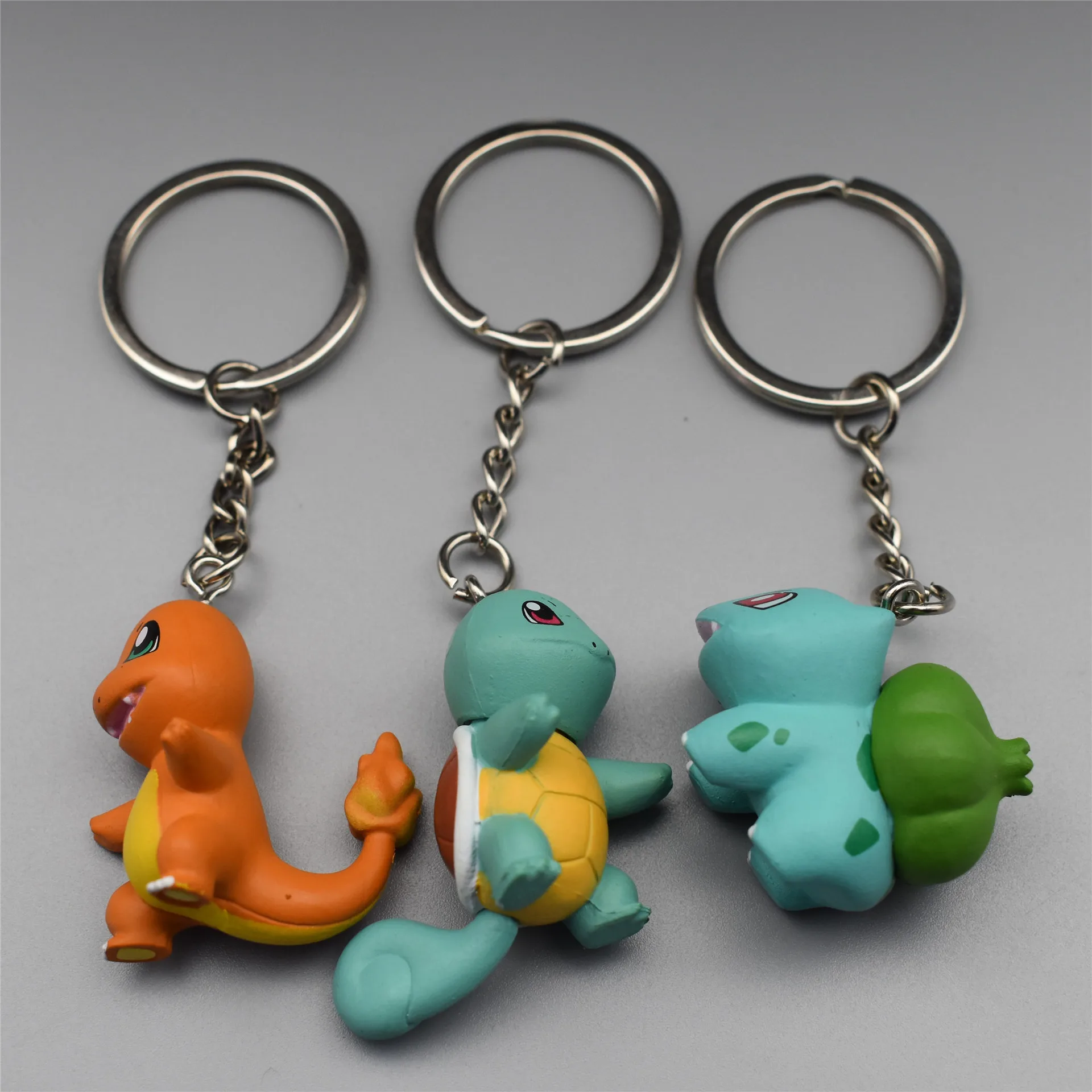 

3Pcs/Set Pokemon Anime Kawaii Keychain Toy Charmander Bulbasaur Squirtle Figure Model Alloy Key Ring Accessorie