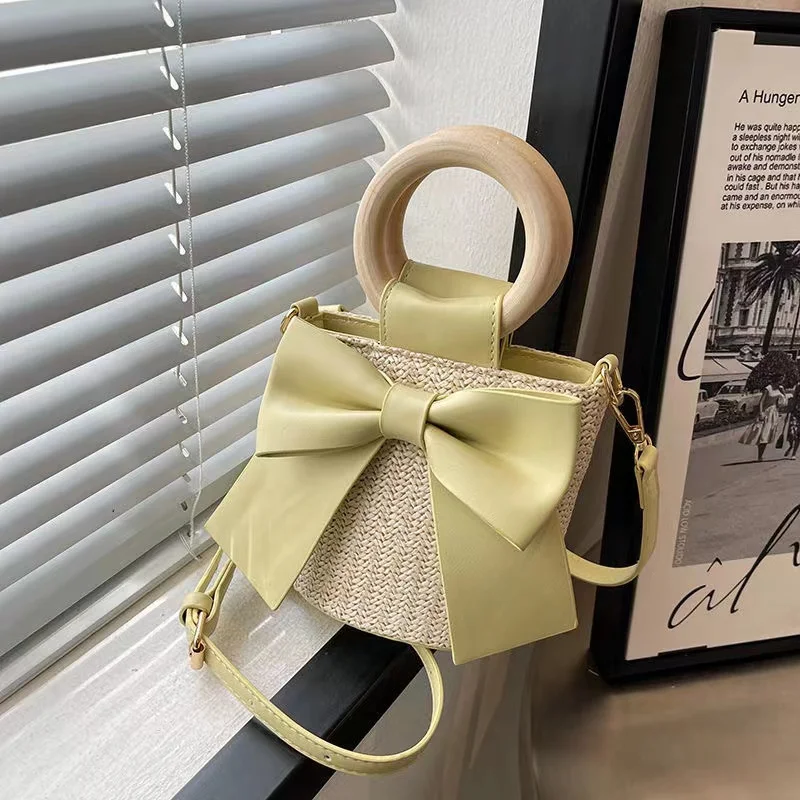 

Bow Tie Design Mini Straw Bucket Crossbody Bag for Women Summer Wooden Handle Tote Handbags and Purses Casual Beach Shoulder Bag