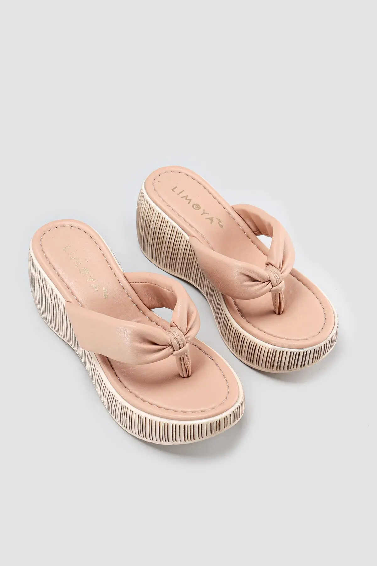

Women's Beige Finger Cross Wedges Slippers