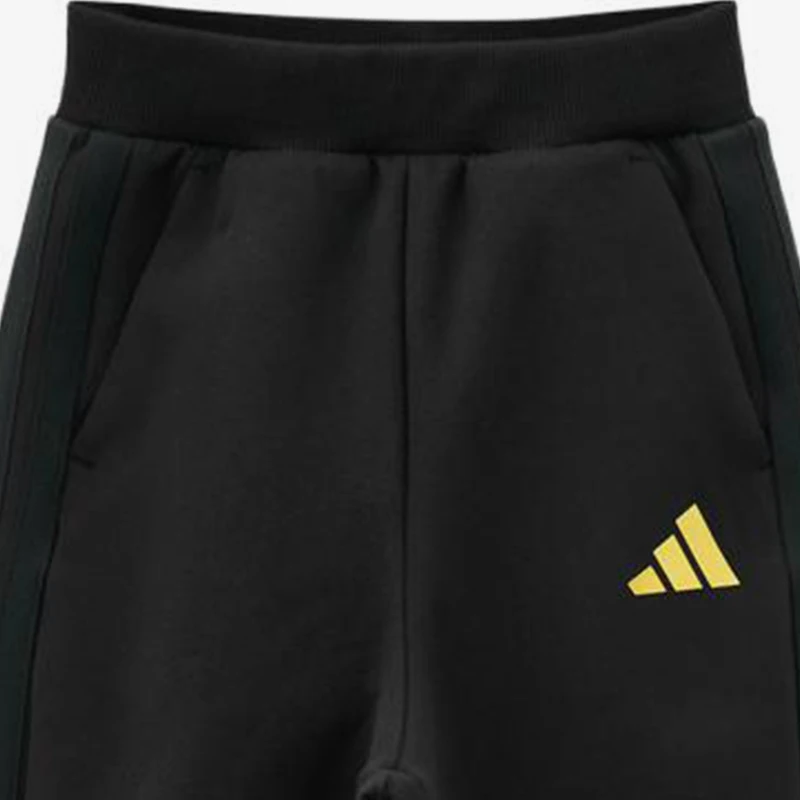 Фото Оригинальные детские спортивные брюки Adidas 128, черно-желтые, приятные к телу, модель KU5595. №4