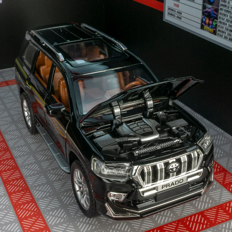 Фото Модель Toyota Prado из сплава металла в масштабе 1:24, двери и капот автомобиля открываются, багажник можно открывать, богато детализирован, тонкая работа. №4