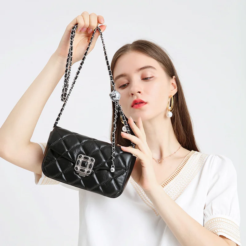 

quality luxury brand Hand high sense summer women's 2023 golden ball small fragrant Lingge chain messenger bag