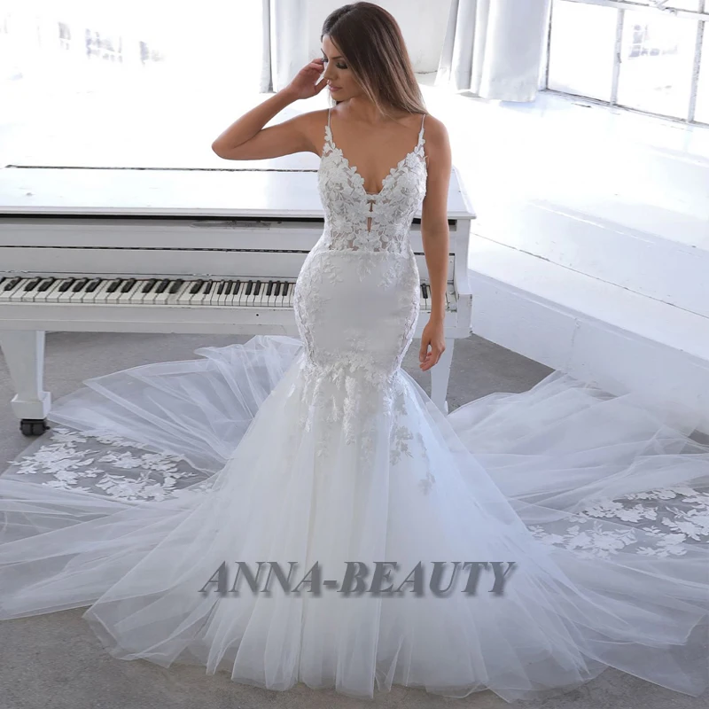 

Anna Sexy Mermaid Spaghetti Straps Tulle Wedding Dresses Appliques Sweep Train Backless Wedding Dresses For Women Customised