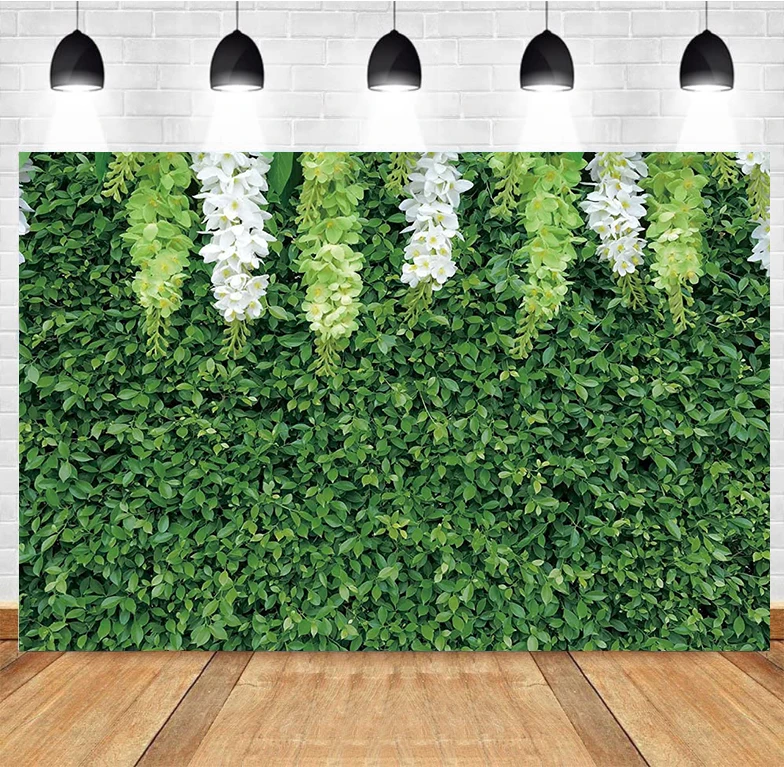 

Фон для фотосъемки с зелеными листьями и белыми цветами