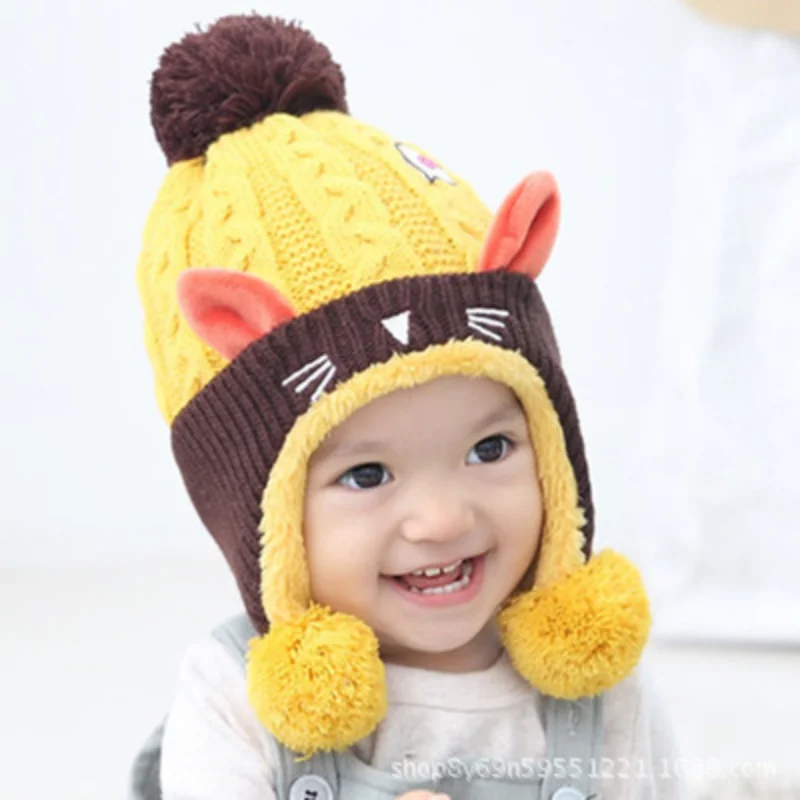 

Autumn and Winter Baby Plush Knitting Hats Boys Girls Kittens Double Ball Ear Protection Warm Wholesale