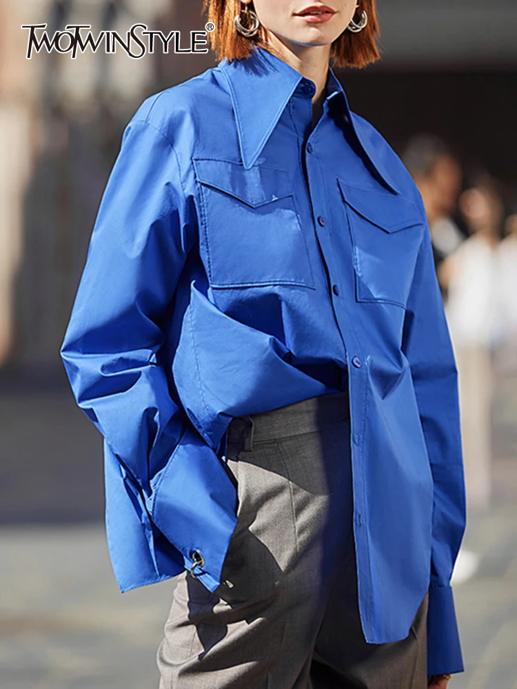 

TWOTWINSTYLE Blue Casual Shirt For Women Lapel Long Sleeve Solid Minimalist Split Hem Button Through Blouse Female Clothing 2022