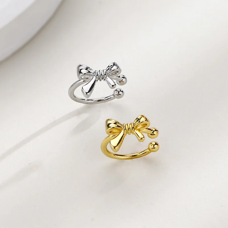 

Милые серьги-клипсы с бантом для женщин и девушек, модные серьги-каффы для ушей, золотистого и серебристого цвета, ювелирные изделия в подар...