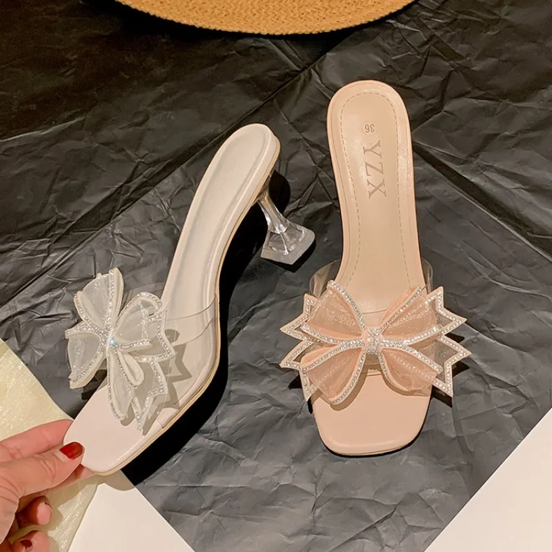 

Женские сандалии на высоком каблуке, шлепанцы с бантом и кристаллами, дизайнерская летняя обувь, шлепанцы с ремешком на пятке, привлекательная обувь, классические туфли-лодочки, сланцы, 2023