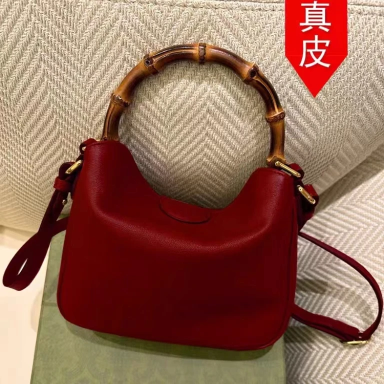 

2023 Fashion New Solid Leather Gold Button Women's Handbag Simple Bamboo Handle Single ladies Shoulder Bag Crossbody Bag