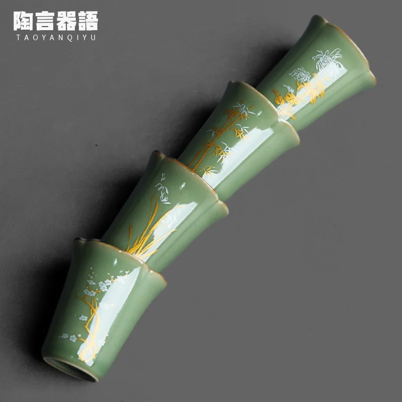 

Yue kiln celadon petal tea cup glaze color picture plum blossom orchid bamboo chrysanthemum four gentlemen theme personal tea si