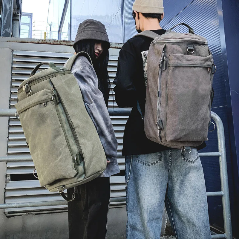 

2022 Fashion Men's Bag Large Capacity Travel Backpack Men's Outdoor Travel Sports Cylinder Backpack Trend Canvas Schoolbag