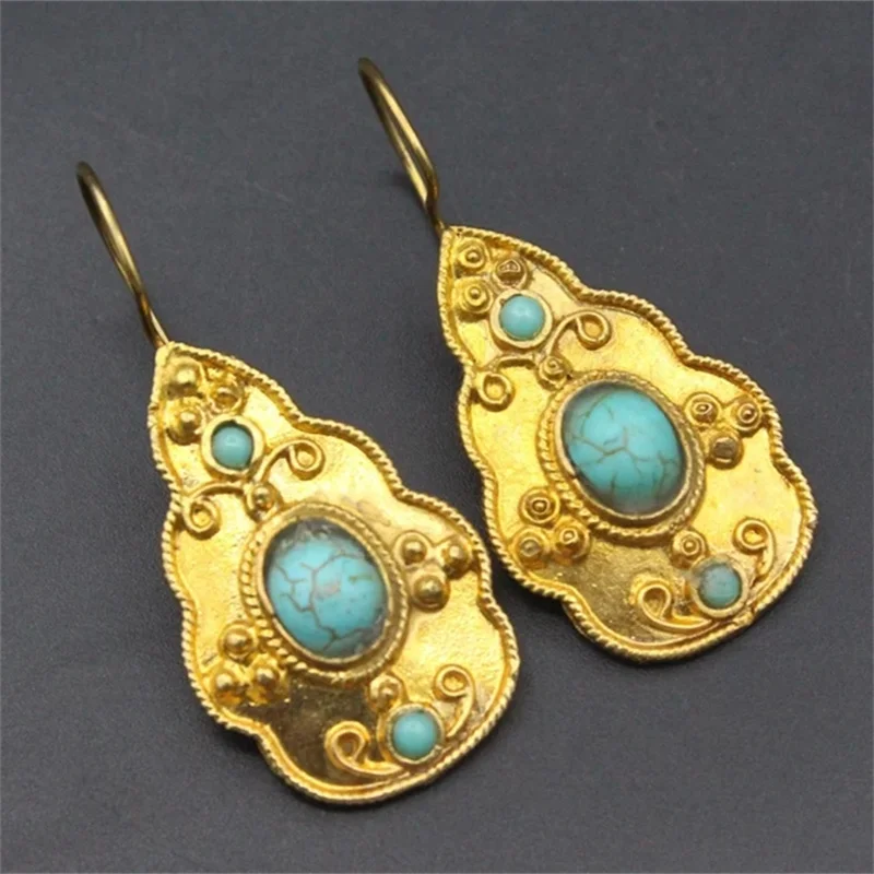 

KYTRD Ethnic Creativity Oval Inlaid with Blue Stone Earrings Vintage Gold Color Metal Carved Patterns Dangle Earrings for Women