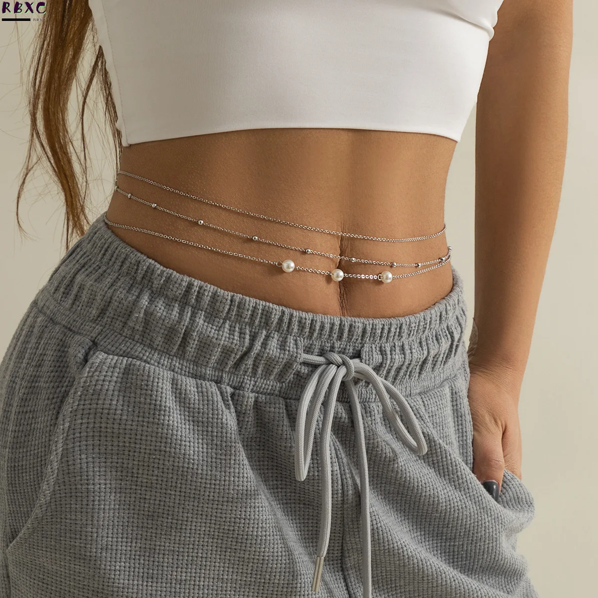 

RBxc Sexy simple imitation pearl chain metal waist chain is mixed and worn with chic Spice Girl Beaded body chain