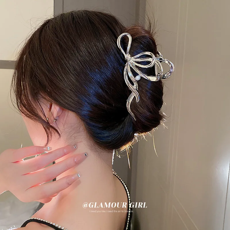 

Korean Ins Pearl Bow Metal Hair Clip With Advanced Design