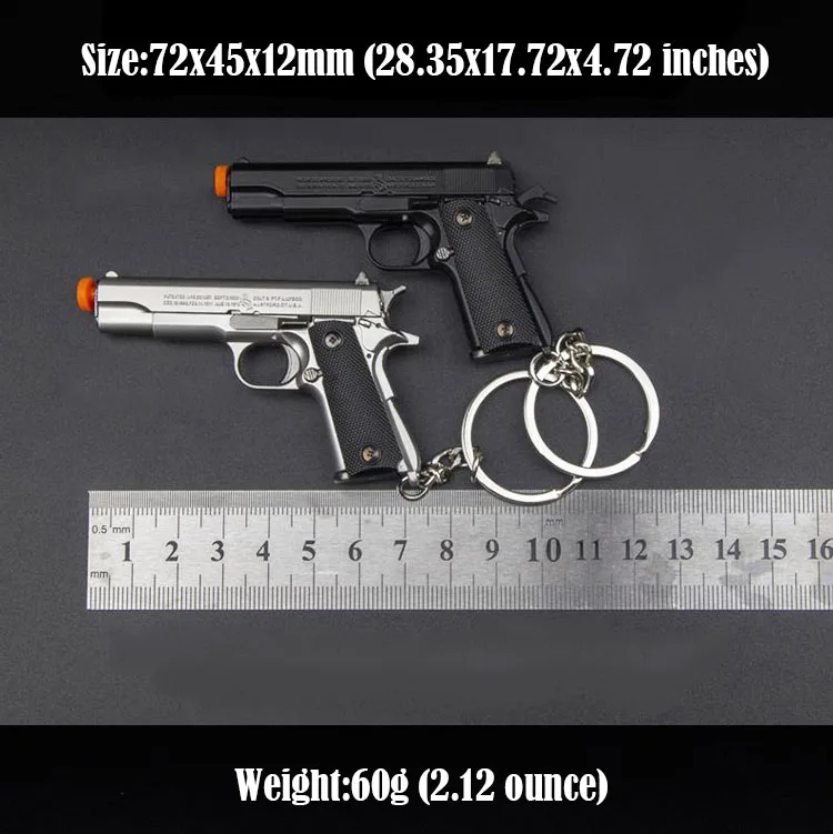 Металлический брелок в форме пистолета