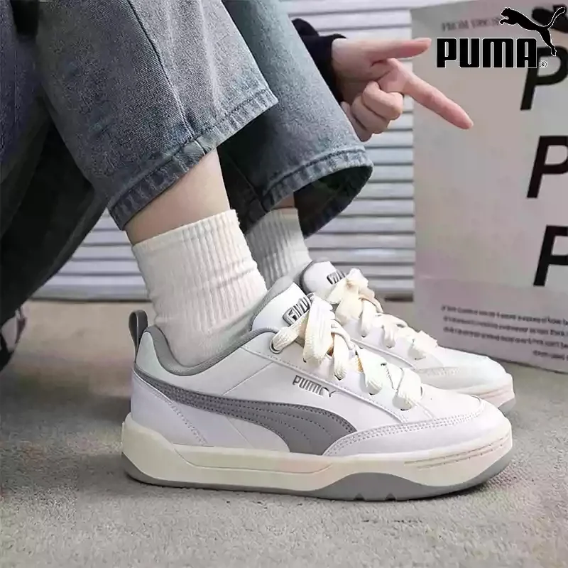 Фото Кроссовки PUMA белые с серым кожаным верхом, на толстых шнурках, с массивной подошвой, повседневные, для скейтбординга, 395084-01 №1
