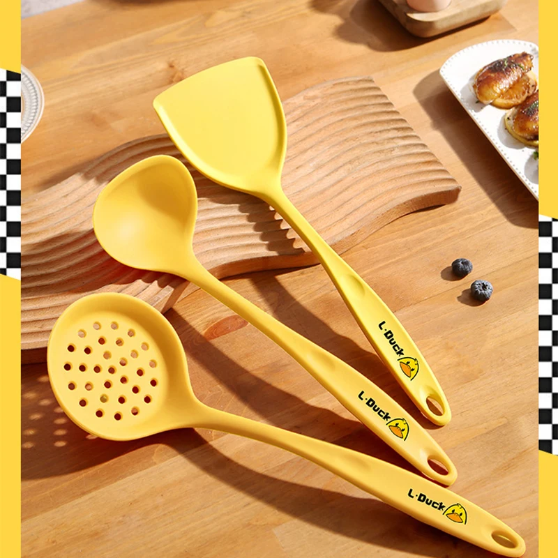

Cartoon silicone kitchen utensils set Food Grade Safe to Coated Pan Pot Non-Stick Cooking Utensils yellow kitchen cooking set