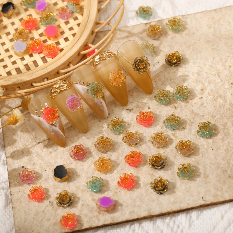 

100Pcs 8mm Glitter Resin Nail Flower Graiden 100Pcs 8mm Resin Rose Flower Cabochons with Gold Glitter Flower