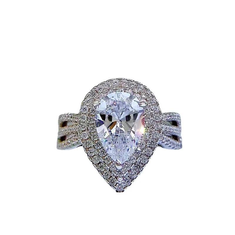 

New fashion trend 925 silver inlaid 5A zircon high carbon diamond luxury surround inlaid drop-shaped gem diamond ring ladies