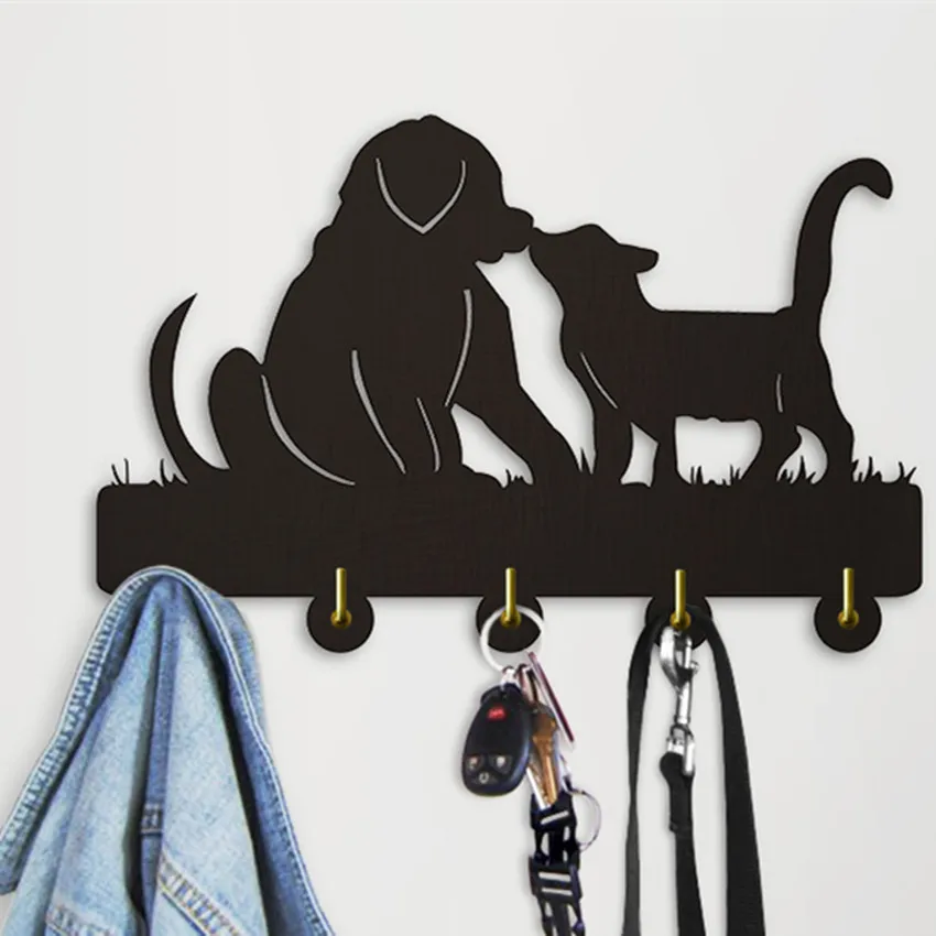 Аксессуары на стену. Дверца для собак в стене. Панно вектор. Вешалка для сумок на дверь голова черной собаки.