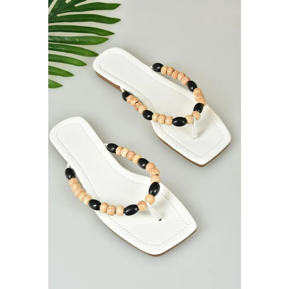 

Dorlie White Beaded Thong Women 'S Sandals K425290409