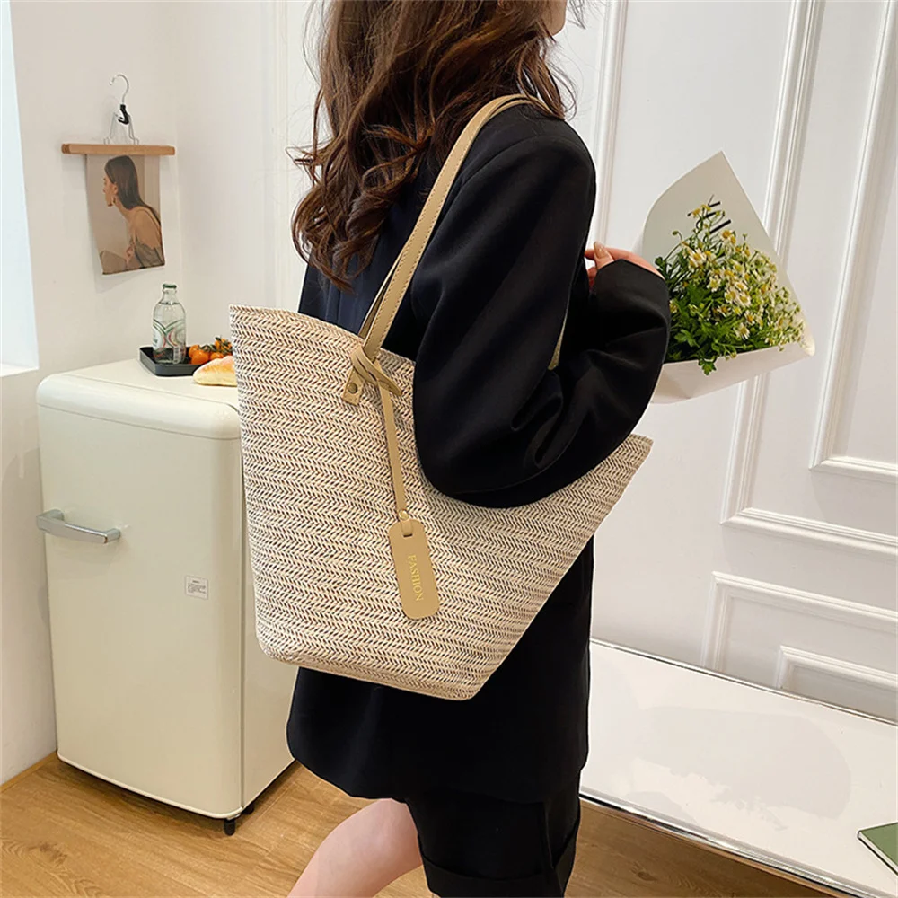 

2022 new straw woven bag hand woven simple handbag holiday travel shoulder bag leisure trend Tote Bag