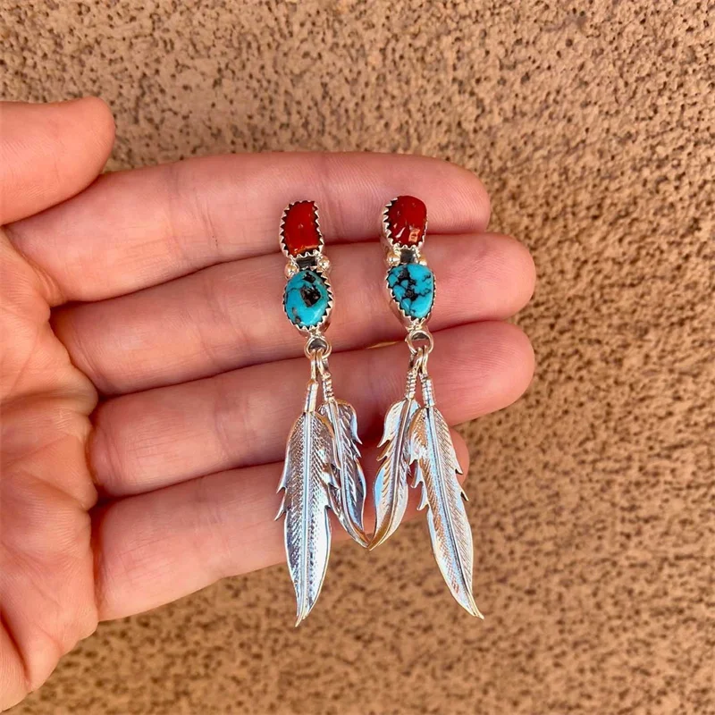 

New European and American Retro Bohemian Women's Earrings Ethnic Personality Feather Two-color Turquoise Pendant Earrings