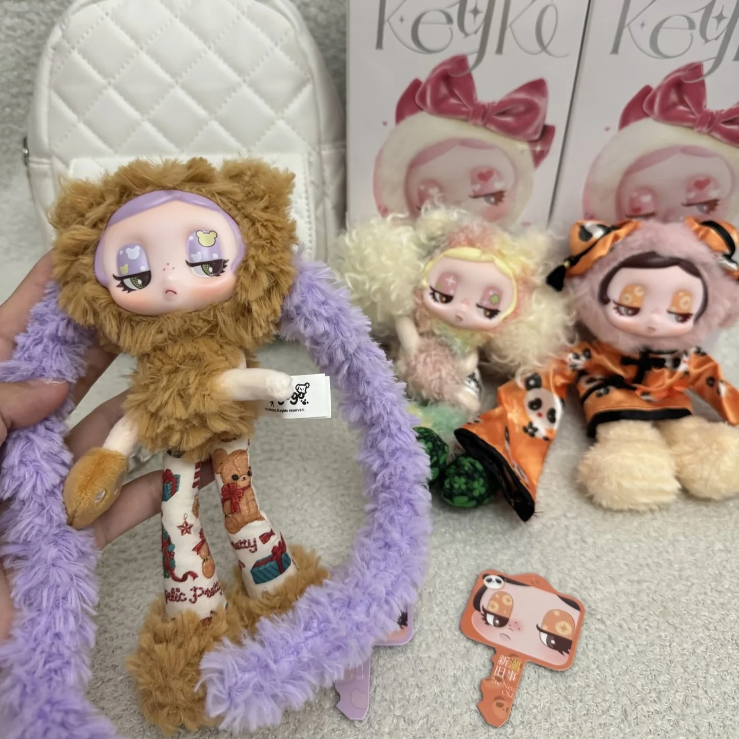 Фото Коллекционная игрушка Colliegogo Keyki Mystery Series в формате сюрприз-бокса: милая пушистая кукла для украшения сумок и рюкзаков, подарок на день рождения или Рождество. №1