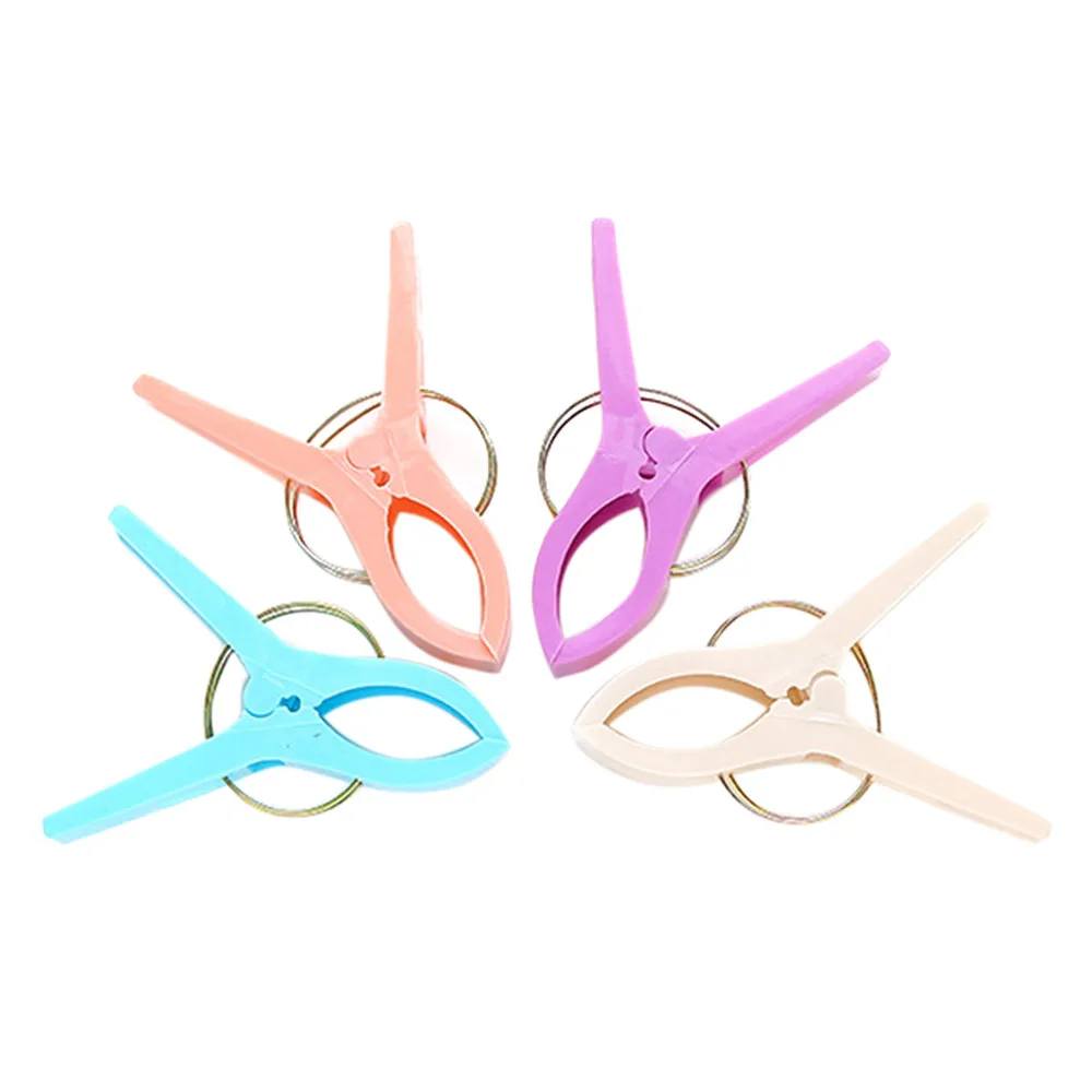 

4Pcs/bag Creative Color Clips Beach Towel Clamp To prevent the wind Clamp Clothes Pegs Drying Racks Retaining Clip