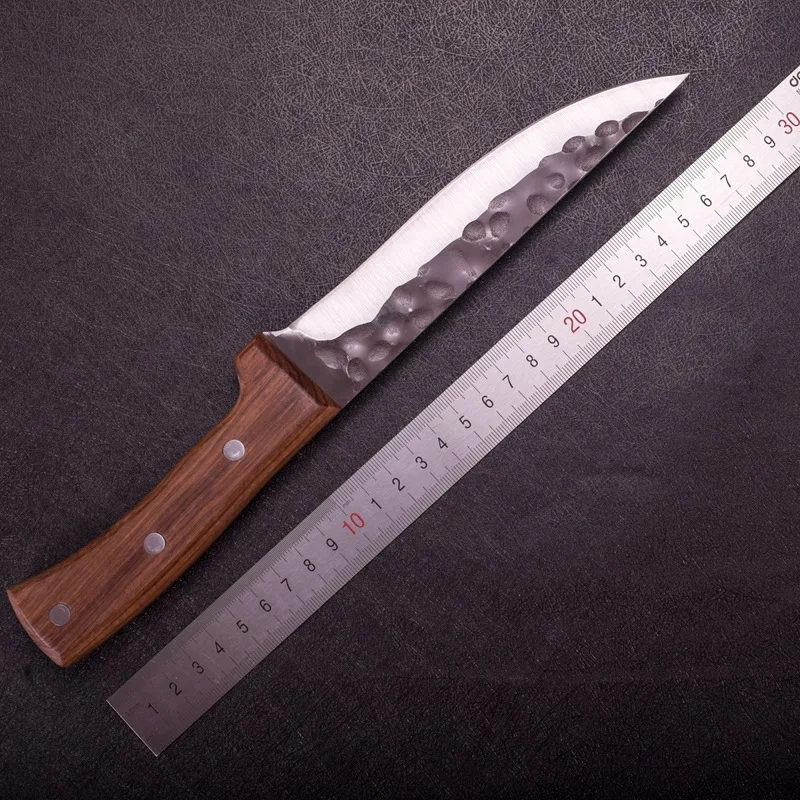 Chef's kitchen uses hand made fish fillet knife, knife edge, hammer pattern, forging knife, carving knife, butcher's bone knife
