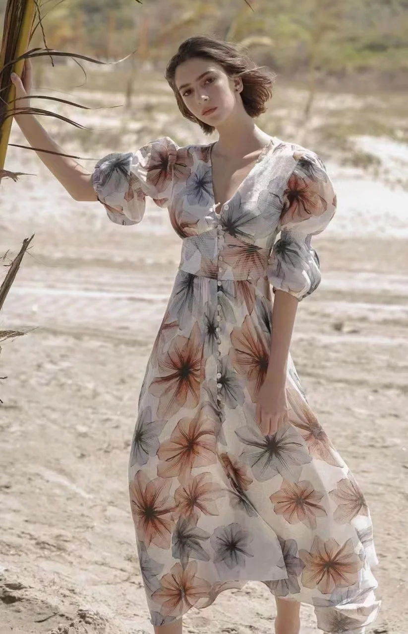 

New French V-neck slim print shell breasted bubble sleeve cotton dress