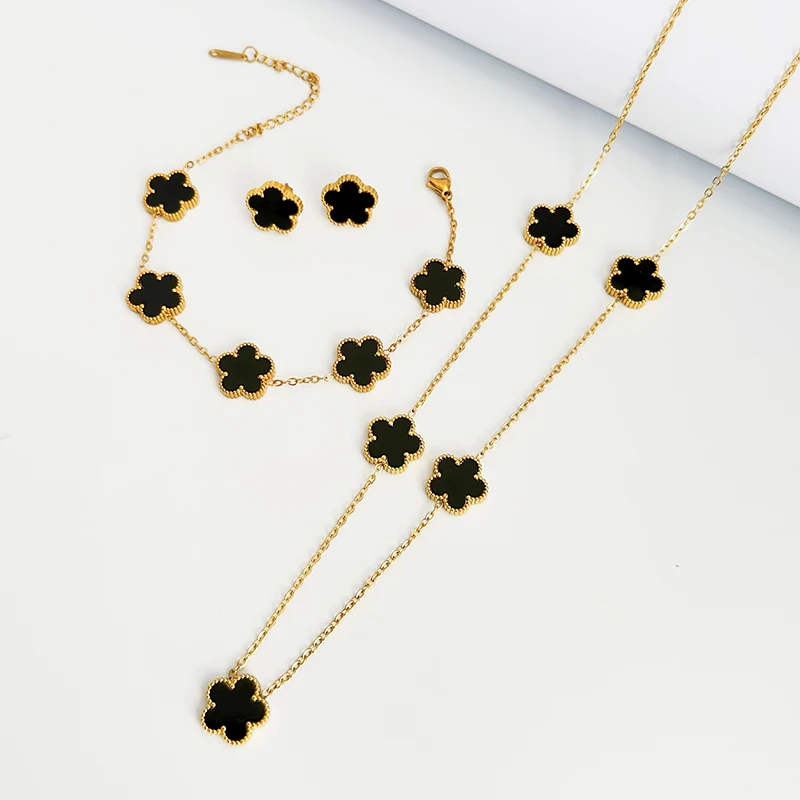 Женский ювелирный комплект из колье серёг и браслета нержавеющей стали