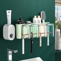 creative toothbrush storage rack punch free mouthwash cup wall hanging bathroom storage automatic toothpaste dispenser