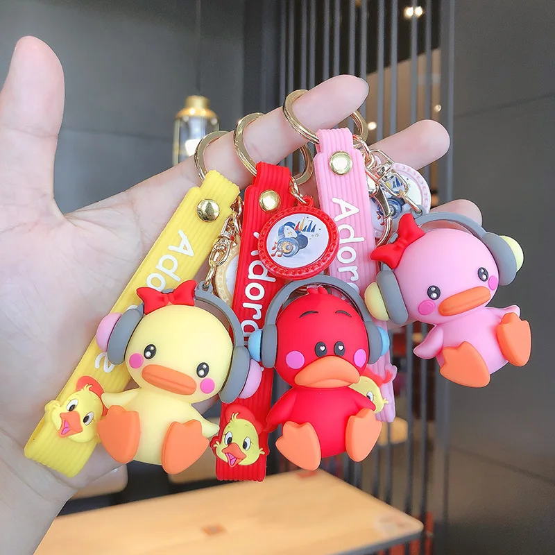 

Креативные маленькие наушники в стиле панк, брелок утка, женские парные Мультяшные милые животные, кукла, брелок для ключей, подвеска-кольцо...