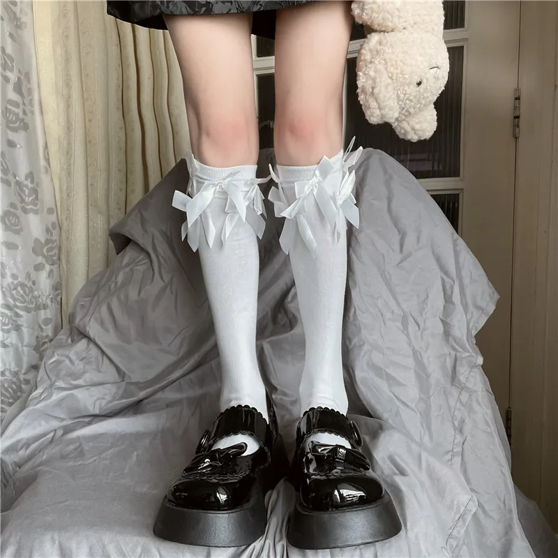 

Носки хлопковые средней длины, с бантом