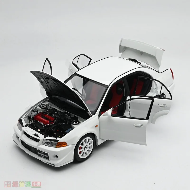 Металлическая модель автомобиля Diecast MotorHelix MH в масштабе 1:18: Mitsubishi Lancer EVO 6.5 (art.: 3920d94076a1e) - 3920d94076a1e