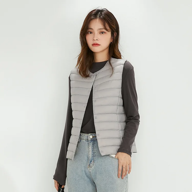 The new 2022 female warm winter light down jacket vest cultivate one's morality in vest bladder tank top white duck down