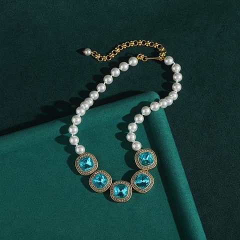 Золотое колье-чокер STALAIT с синим кристаллом и жемчугом
