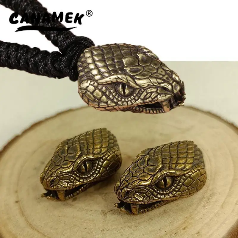 

Медные брелоки с головой змеи