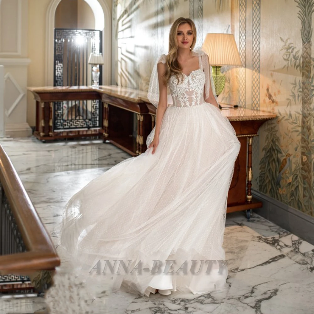 

Anna Illusion Sweetheart Wedding Dresses Spaghetti Strap Lace Appliques Simple Sleeveless Zipper Court Train Custom Made
