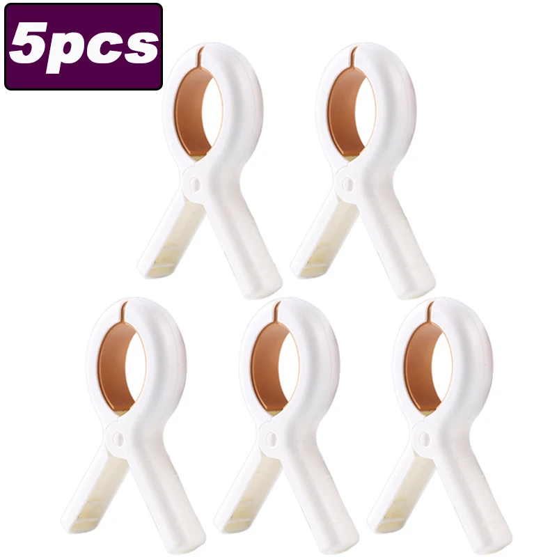 

Пластиковые прищепки для белья желтые