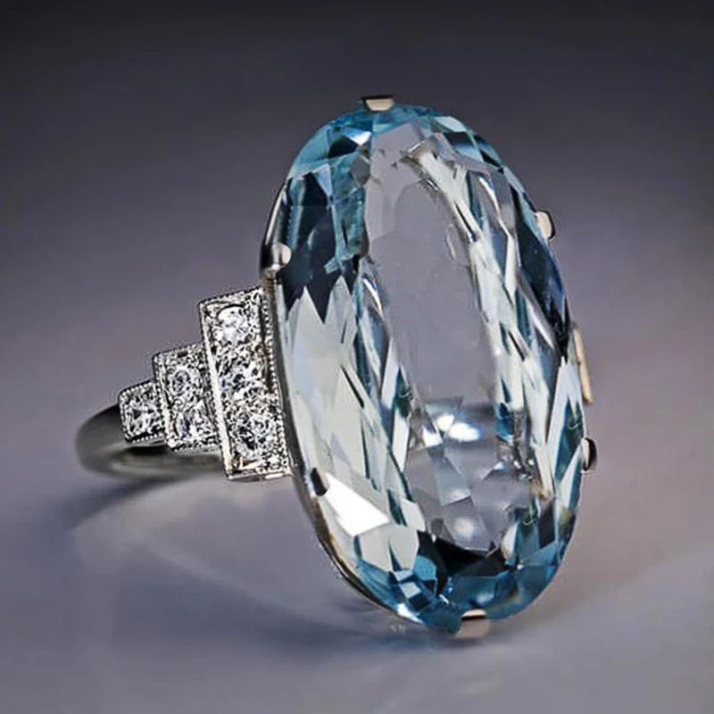 

Female Light Sky Blue Wedding Ring Solitaire Band Oval Stone Engage Party Women Luxury Jewelry Shine CZ Stone Best Gift
