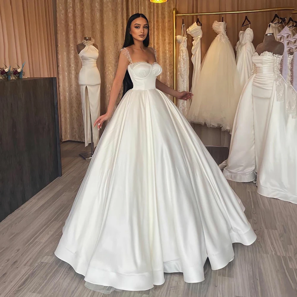 UZN Modern A-Line Satin Wedding Dresses Robes de mariée Beading Sweetheart Neckline Sheer Straps Bridal Gowns Simple Dubai Bride
UZN Modern A-Line Satin Wedding Dresses Robes de mariée Beading Sweetheart Neckline Sheer Straps Bridal Gowns Simple Dubai Bride