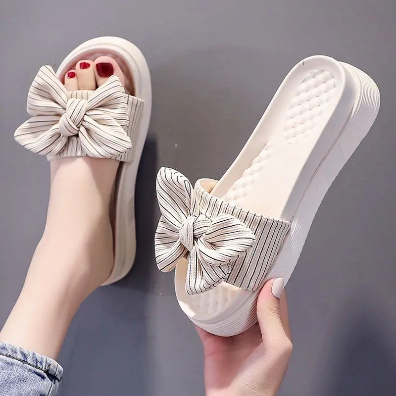 

Elegant sandals and slippers women's 2022 summer new soft bottom sandals flat bottom thick bottom one word beach home slippers